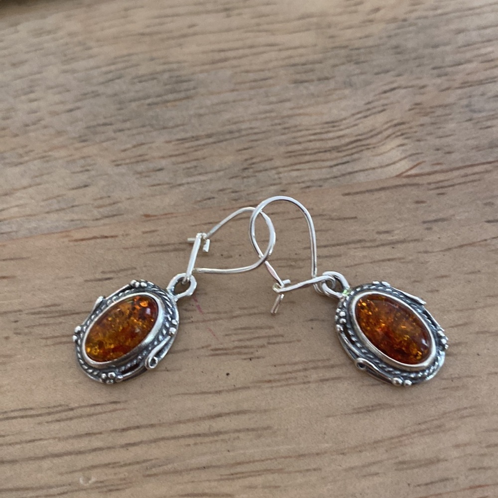 Brand new amber and sterling silver earrings.